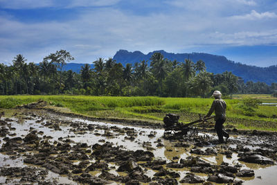 Farmer working on agricultural field