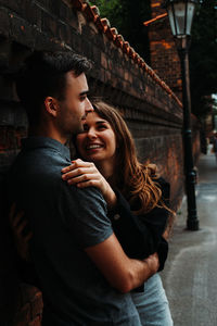 Young couple standing outdoors