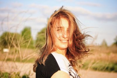 Portrait of smiling young woman