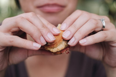 Close-up of man eating food