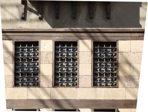 FULL FRAME SHOT OF BUILDING WITH WINDOWS