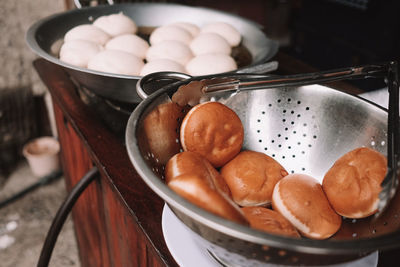 Close-up of sweet food in containers on table