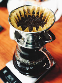 High angle view of coffee cup on table