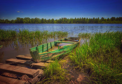 Scenic view of lake and boat