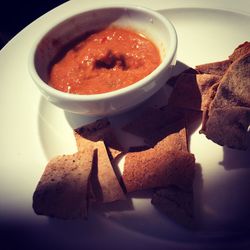 Close-up of serving soup in bowl