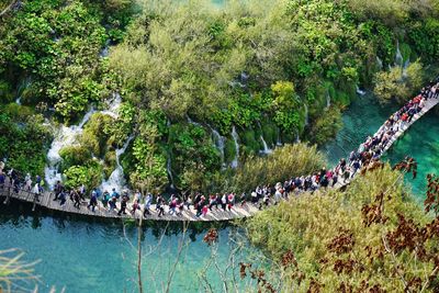 High angle view of people by lake