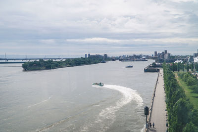 High angle view of bridge over river against cloudy sky