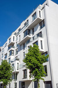 Low angle view of building against blue sky