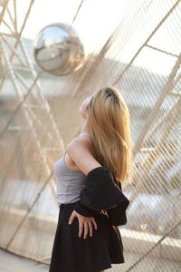 High angle view of woman standing on floor
