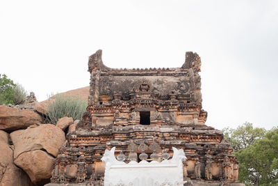 Old ruins of temple against clear sky