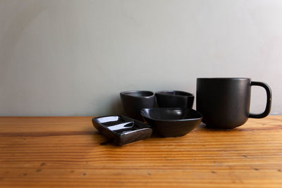 Close-up of coffee cup on table