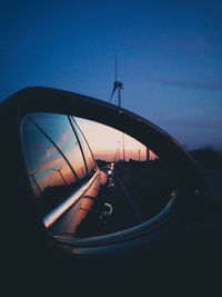 Reflection of car on side-view mirror