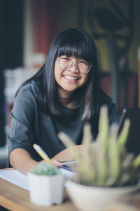 Portrait of a smiling young woman