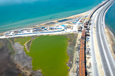 High angle view of road by sea