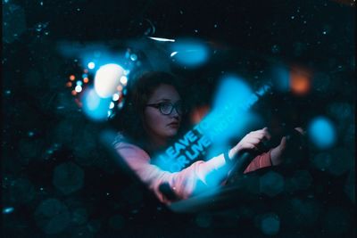 Close-up of woman driving