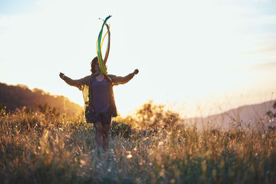 Agility, youth, dream, enjoy, free time, nature, sunset, golden, holiday, relaxation, woman, girl, travel, summer, exercise, sky, vacation, water, fitness, silhouette, relax, dancer, people,