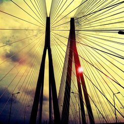 Low angle view of cables against sky