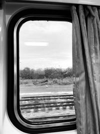 Scenic view of train seen through window