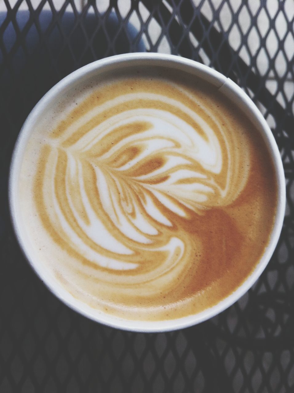 coffee cup, drink, froth art, refreshment, coffee - drink, cappuccino, frothy drink, food and drink, saucer, freshness, table, indoors, coffee, latte, close-up, still life, art, design, creativity, high angle view