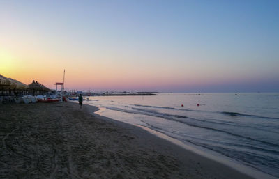 Scenic view of beach during sunset