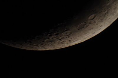 Close-up of moon over black background