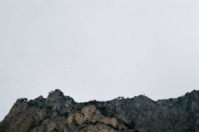 Low angle view of mountain against clear sky