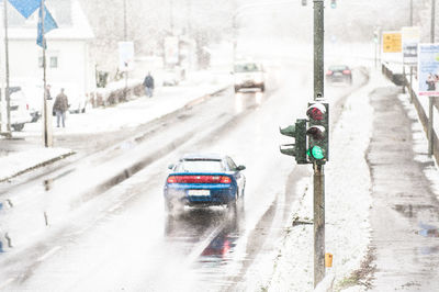 Vehicles on road in winter