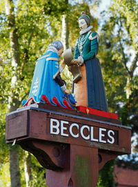 Low angle view of statue against trees