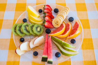 High angle view of orange fruits on table