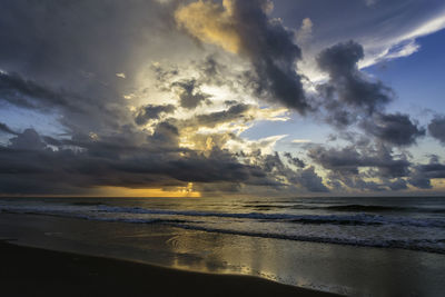 Scenic view of sea against sky during sunset