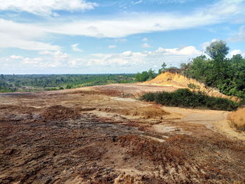 Scenic view of land against sky