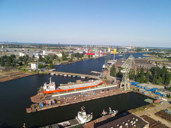 High angle view of river amidst buildings in city