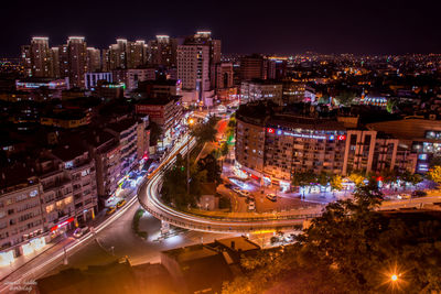 High angle view of illuminated cityscape at night