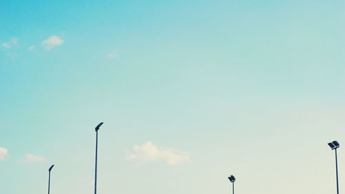 Low angle view of street light against sky