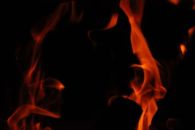 Close-up of bonfire against black background