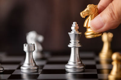 Close-up of chess pieces against blurred background