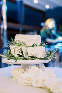 Close-up of wedding rings on table