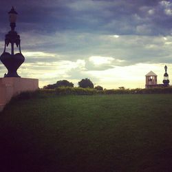 Built structure against sky at sunset