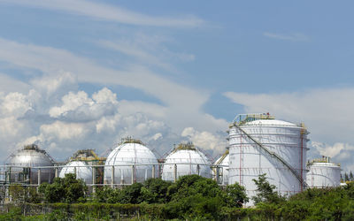 Low angle view of factory against sky