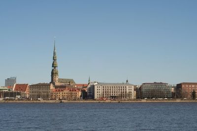 A shot of the capital of latvia - riga center from the other side of the river daugava.