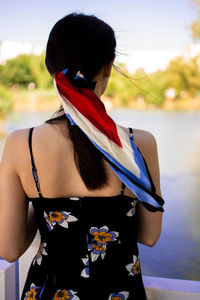 Side view of young woman looking away