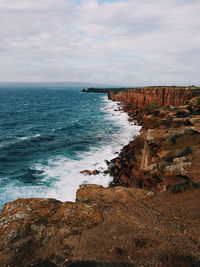 Waves breaking on rocky coast