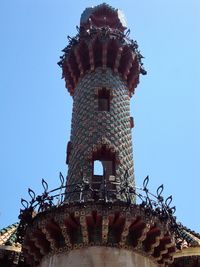 Low angle view of historical building against clear blue sky