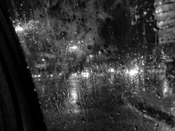 Close-up of wet window in rainy season