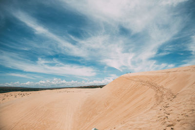 Scenic view of desert against sky