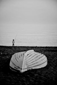 Woman standing on beach