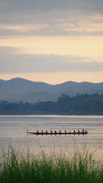 Scenic view of mekong river against sky during sunset