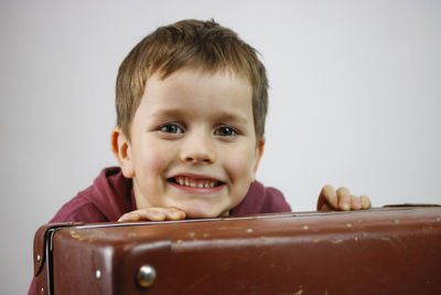 Close-up portrait of smiling boy