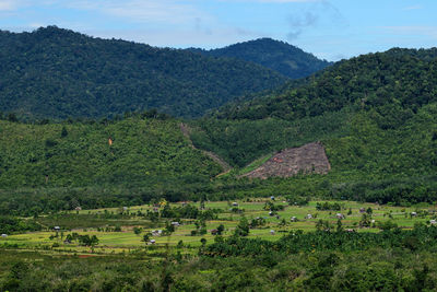 Scenic view of field against mountains