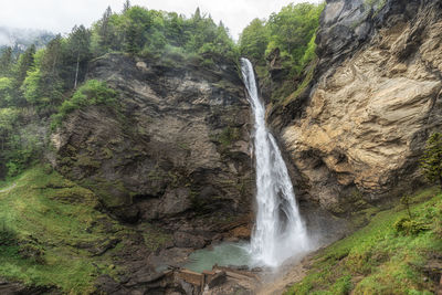 The view of reichenbach falls waterfall. famous waterfall in bernese oberland region of switzerland.